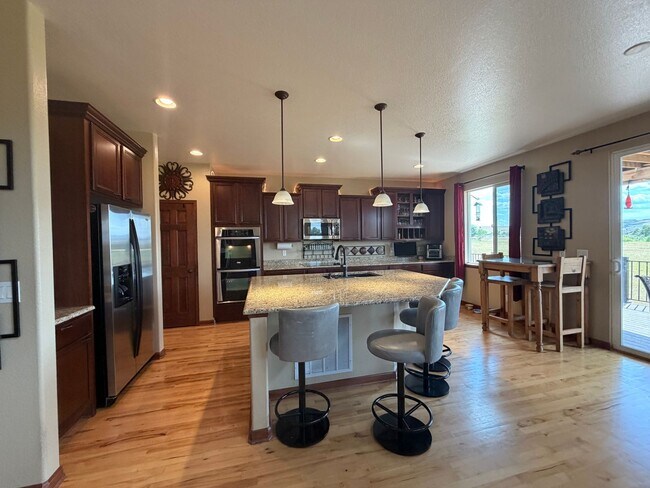 Building Photo - Luxury Furnished Executive Home with Entertainers Basement, Trex Deck & 3-Car Garage