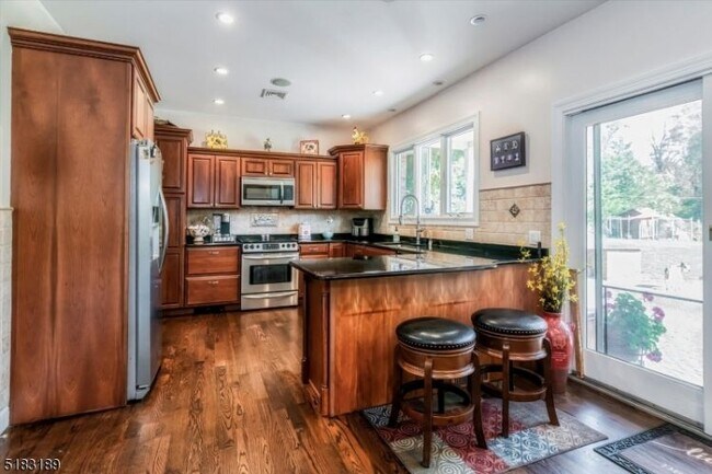 Building Photo - 5 Saddle Ridge Rd