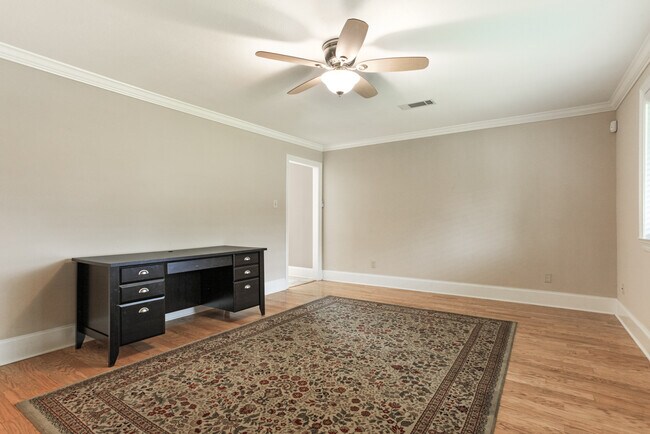Enter into light filled dining room, office or living area - 5012 Antonini Dr