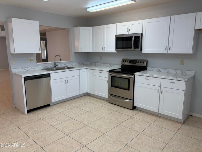 Building Photo - 5810 W Kesler St