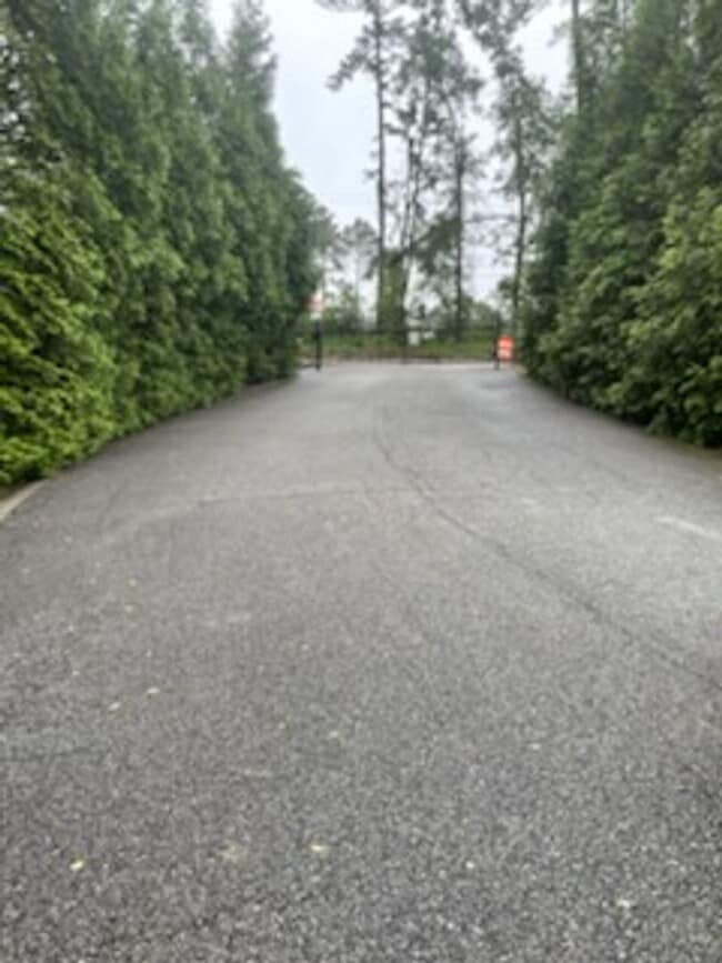 Building Photo - GORGEOUS EXECUTIVE TOWNHOME IN GATED COMMUNITY