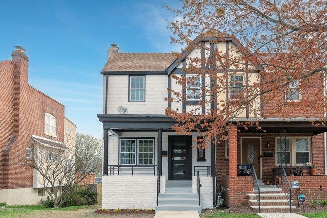 Building Photo - Tudor Duplex w/ 3 Parking Spaces + EV Charging and Garage