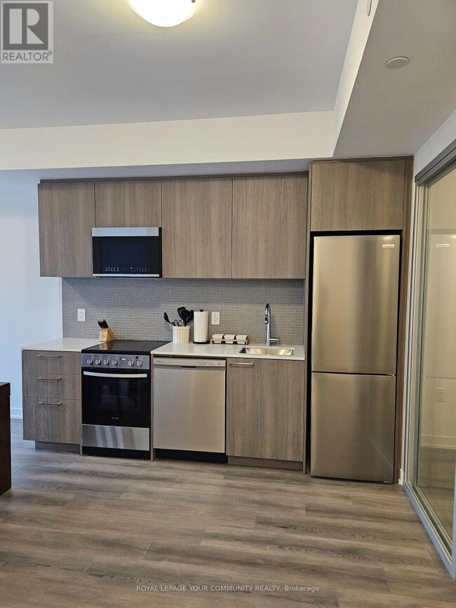 Building Photo - 7439 Kingston Rd