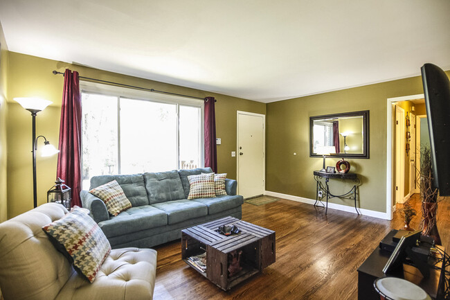 Photo 3. Living Room. Current wall color is a soothing lilac - 1623 Lethia Dr