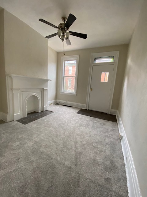 Living room with new carpet - 126 45th St