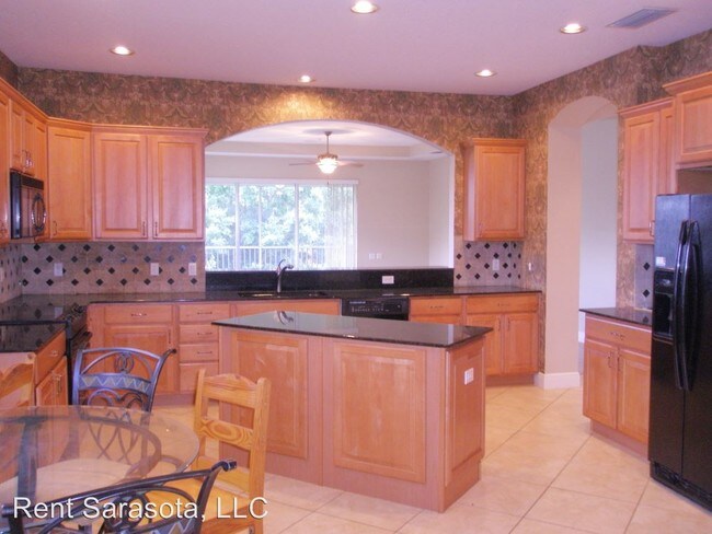 Foto del edificio - 6560 Moorings Point Cir