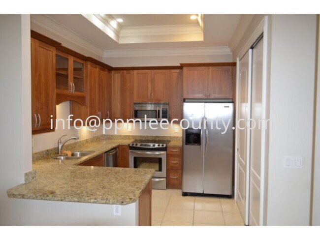 Building Photo - Fantastic 2nd Floor Luxury Condo with GARA...