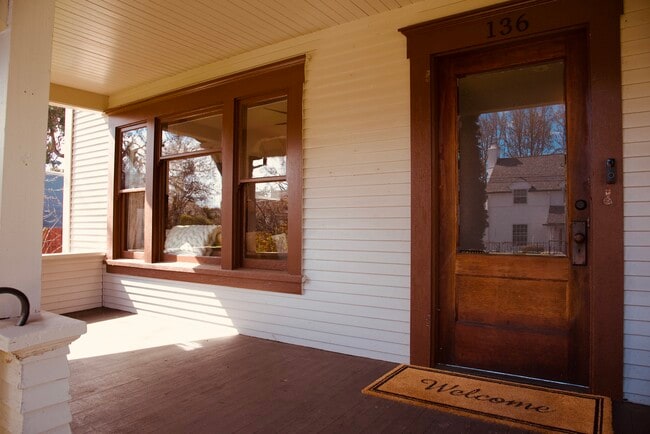 main house porch - The Dwelling Place