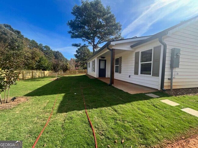 Building Photo - 5968 Moon Dr