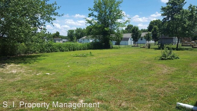 Building Photo - 3 br, 1.5 bath House - 105 N. Lawrence St.