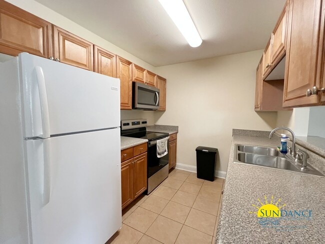 Building Photo - Furnished beautiful townhouse with community pool & playground!