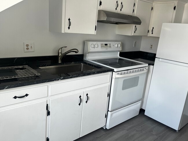 Kitchen with new countertops - 10 Elm St
