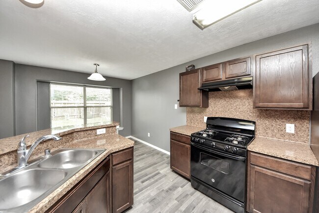 Foto del edificio - 9219 Dewberry Blossom Ln