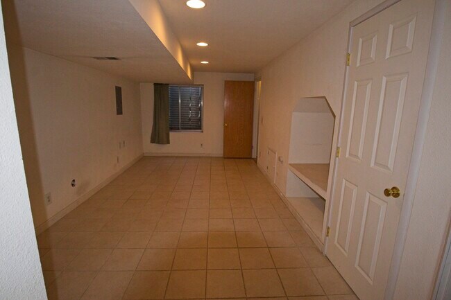 finished basement facing front - 9545 W Coal Mine Ave