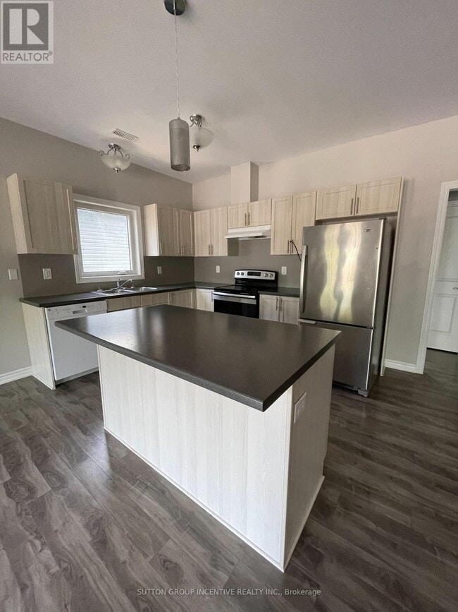 Photo du bâtiment - 1803 River Rd W