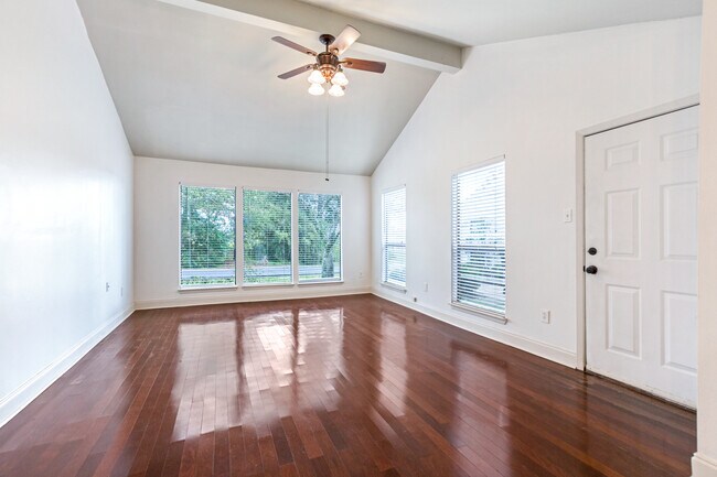 Living Room with Vaulted Ceiling and Wood Floors - 10333 Jefferson Hwy