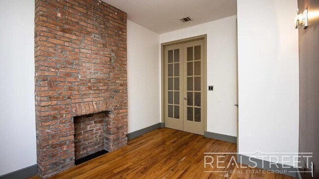Building Photo - Gut-Renovated 3BR + Massive Finished Basement | Backyard, Laundry & HVAC | Bushwick