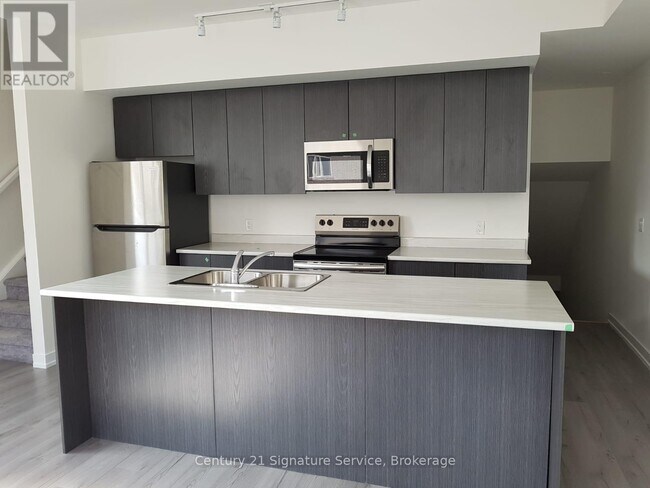 Photo du bâtiment - 3062 Sixth Line