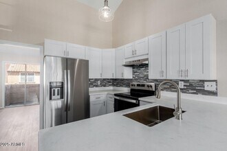 Building Photo - 4601 N 102nd Ave