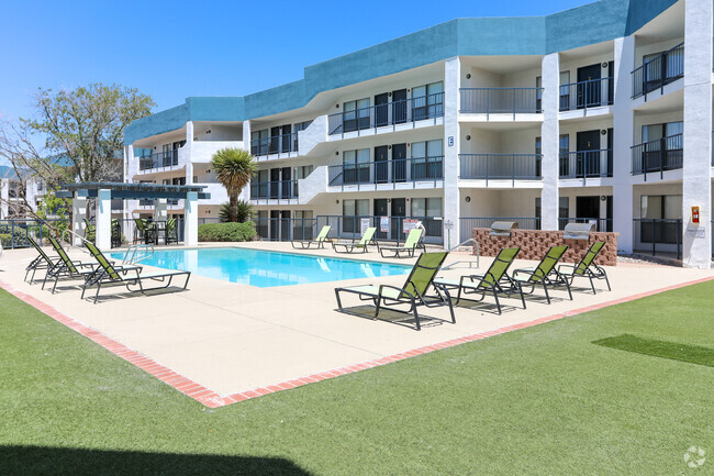 Lounge seats by pool - Peaks at Sandia View