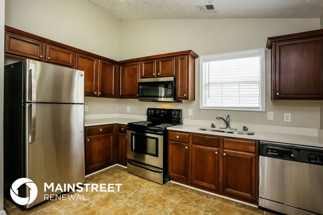 Foto del edificio - 4150 Riverbank Ct