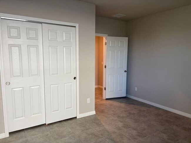 Photo - Like-New 4 Bedroom 3 Bath with Pond View & Two Living Spaces — Minutes to South Lake Nona House