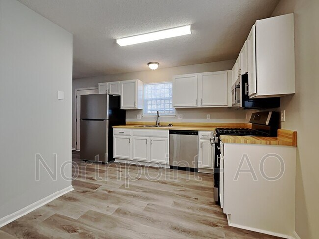 Building Photo - 4203 Woodland Ave