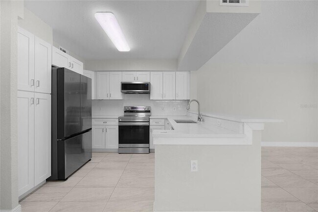 Foto del edificio - 13929 Fairway Island Dr