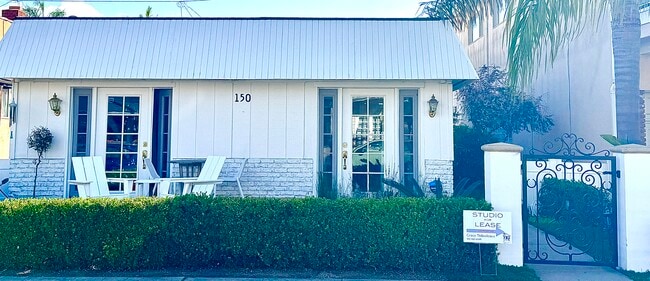 Building with gate - 150 Pomona Ave