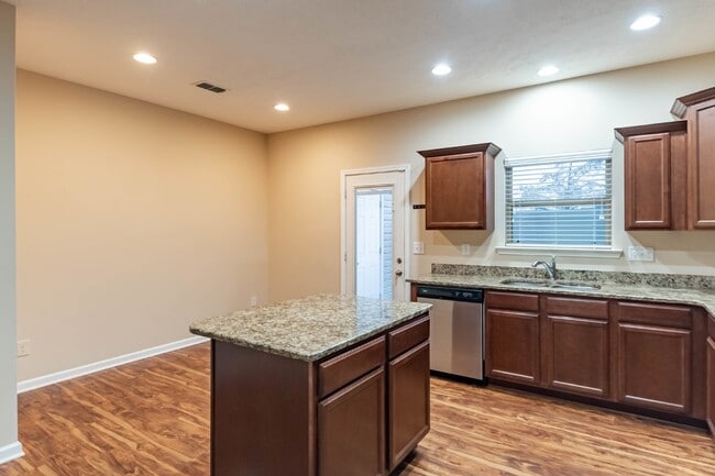 Building Photo - Available Now! Wonderfull Location! 2/2.5 Townhome w/ Upgrades.
