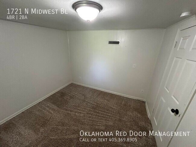 Foto del edificio - 1721 N Midwest Blvd
