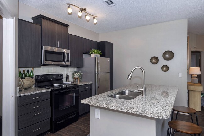 Building Photo - Seasons at Umstead Apartment Homes