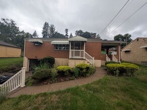 Building Photo - 631 Regis Ave