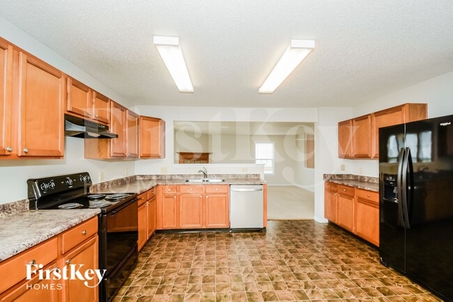 Building Photo - 5661 Grassy Bank Dr