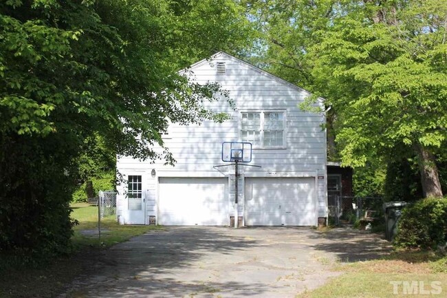 Large Driveway with Garage and Basketball Hoop - 1106 S 10th St
