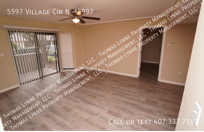 Building Photo - 5997 Village Cir N