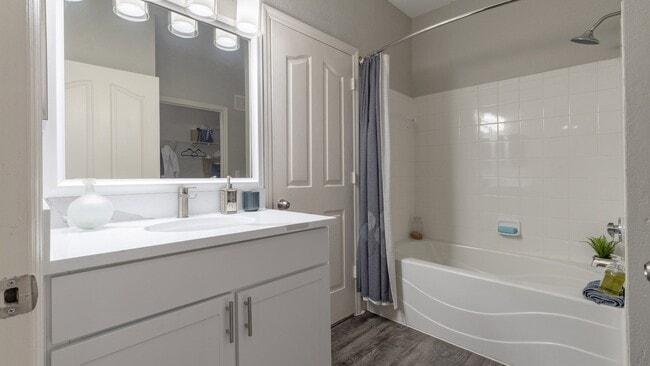 Modern Bathroom with Large Framed Mirror and Ample Storage - Enders Place at Baldwin Park