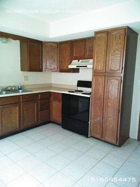 Building Photo - 219 N Garrison Ave