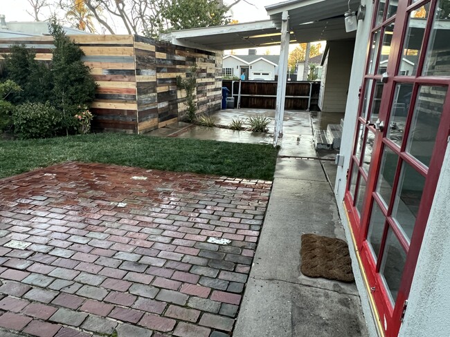 back yard looking towards car port - 17321 Martha St