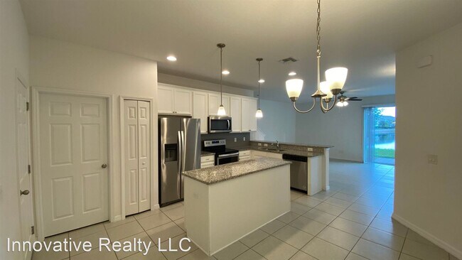 Building Photo - 3 br, 2.5 bath House - 6952 Tussilago Way