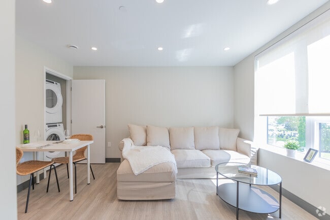 2BR, 1BA - 638SF - Living Room - 699 Niagara Street LP