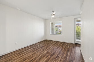 2BR, 2.5BA 1,317SF - Living Room - Campus Oaks Apartments