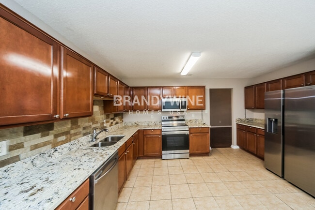 Building Photo - 6828 Kamali Ave