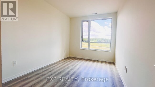Building Photo - 181-6181 Elmira Rd S
