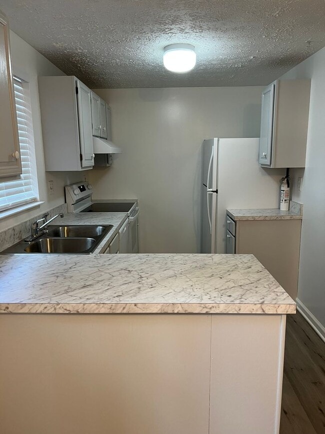 Photo - Renovated End-Unit Ready to Move-In House