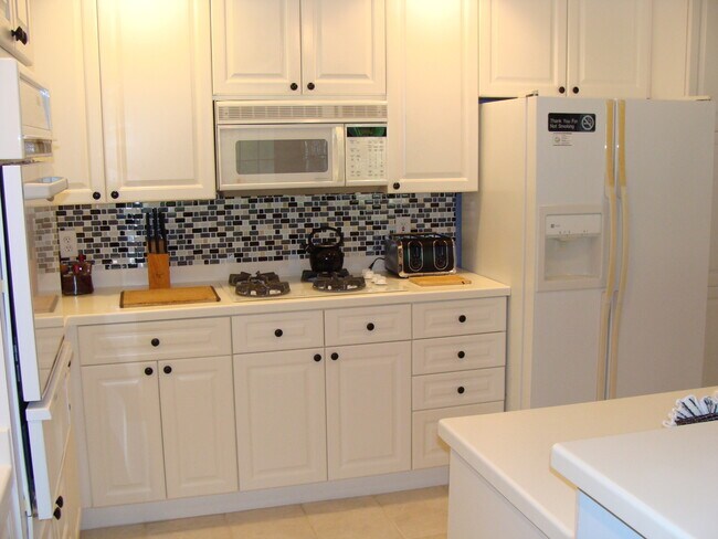 Foto del edificio - Spacious 3BR/3BA Ground-Floor Condo with W...