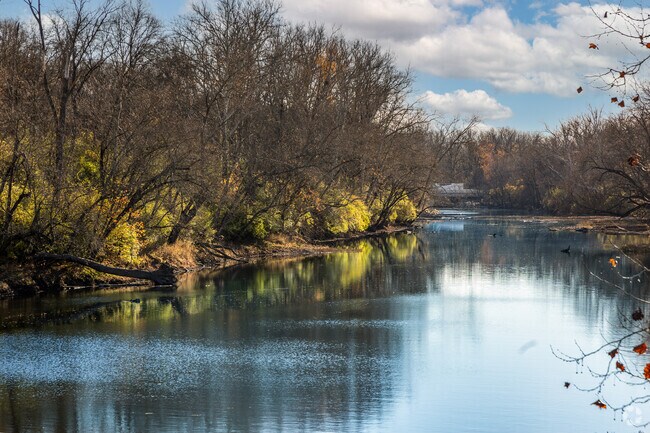 Taylorsville Metro Park wraps around a lake.