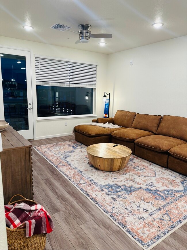 Spacious living room with large picture window - 6153 N Ceylon St