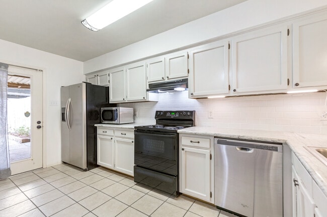 Kitchen with Stainless Steel Appliances - 10333 Jefferson Hwy