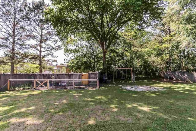 Backyard, view from door, garden to left - 125 Wilson St